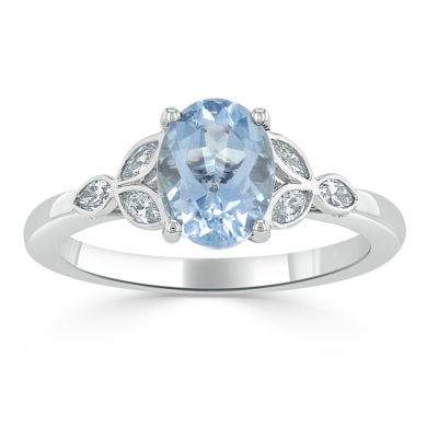 A light blue aquamarine stone set alongside diamonds.